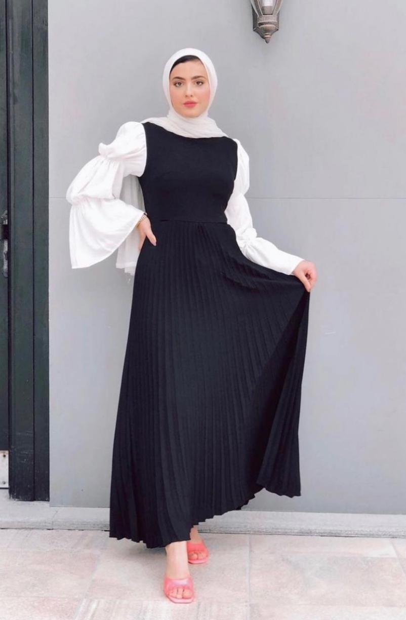  مريم حسن بفستان بليسي بأكمام عصرية -الصورة من حسابها على الانستغرام