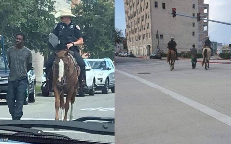رجال شرطة تكساس يقودون رجلا من أصول أفريقية بحبل متصل بأصفاد