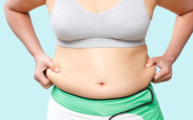 اسباب تكدس الدهون في منطقة البطن: وكيفية العلاج